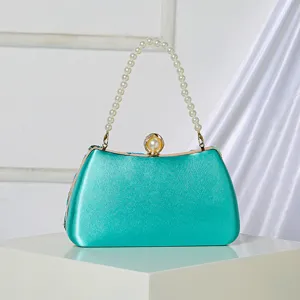 Elegant teal satin evening clutch bag with pearl handle and clasp for women parties