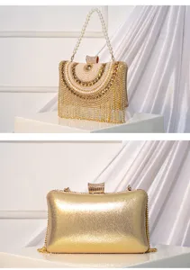 Elegant gold rhinestone evening clutch bag with pearl handle and sparkling tassel fringe details.