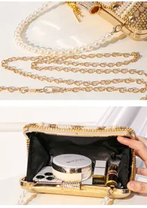 Elegant rhinestone evening clutch bag with pearl and gold chain straps, perfect for parties and proms.