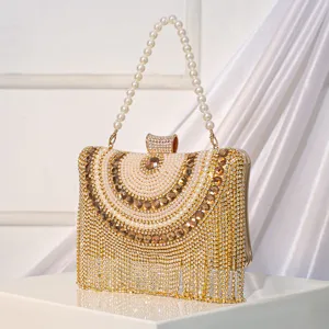 Luxury rhinestone evening bag with pearl handle and glittering crystal fringe for women wedding party.