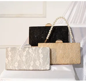 Sequin lace evening clutch bag with pearl handle and metal clasp detail showcasing elegant style.