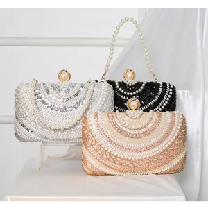 Élégante pochette de soirée perlée et pailletée, sac à main de luxe pour mariage et fête.