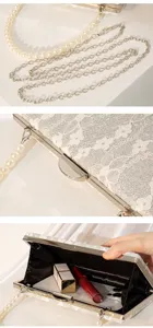 Silver sequin lace evening clutch bag detail, pearl handle and metal chain, elegant design.