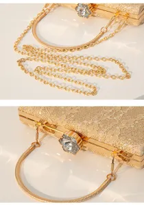 Gold sequin evening bag close-up detail showcasing exquisite crystal clasp and metal chain strap.