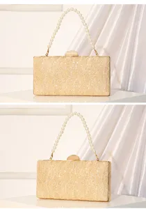 Gold sequin evening clutch bag detail showing delicate pearl handle and metallic frame design.