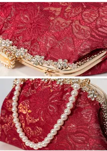 Close-up detail of red lace evening bag with sparkling rhinestones and pearl chain strap.