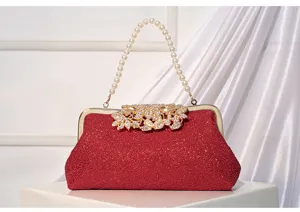 Red lace evening clutch bag with pearl handle and floral clasp for banquet and dress.