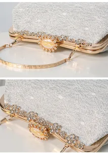 Elegant silver lace evening clutch bag with gold rhinestone clasp and chain strap for women.