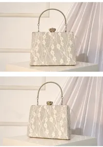 Details of elegant white lace sequin evening clutch bag with metal handle and retro clasp.