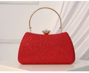 Elegant red evening clutch bag with gold round handle and crystal clasp for women parties.