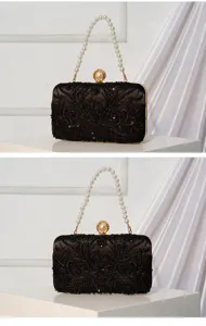 Black beaded evening clutch bag with pearl handle and floral embroidery for weddings.