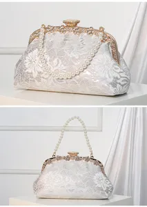 Silver lace evening clutch bag with pearl handle, elegant wedding bridal handbag and purse.