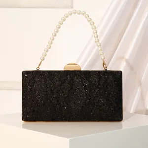 Black sequin evening clutch bag with elegant pearl handle and gold hardware for women party