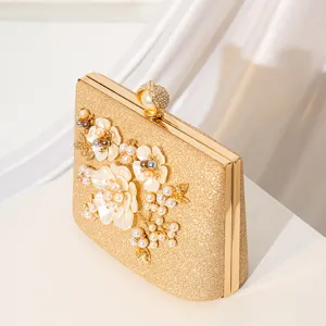 Gold glitter evening clutch bag with pearl floral rhinestones, elegant wedding party handbag for women.