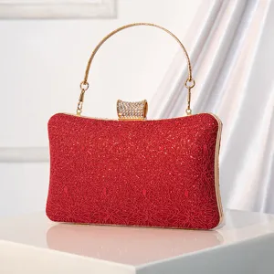 Elegant red lace sequin evening clutch bag with metal handle and sparkling crystal clasp main view