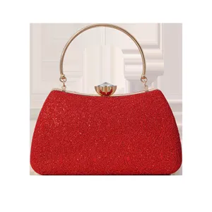 Elegant red evening clutch bag with round metal handle and crystal clasp for bridal and parties.