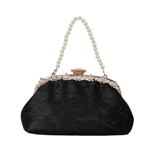 Elegant black lace evening clutch bag with pearl handle and rhinestone clasp for wedding party.