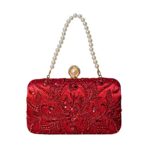 Elegant red satin beaded evening clutch bag with pearl handle for wedding and party events.