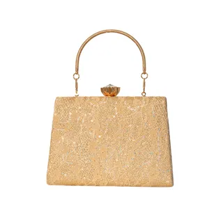 Elegant gold sequin lace evening bag with metal handle and crystal clasp for women parties.