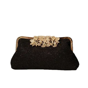 Elegant black glitter evening clutch bag with luxury gold leaf clasp for party dress.