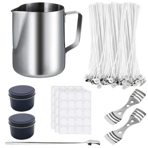 Detailed view of the stainless steel candle making pitcher, wicks, tins and accessories.