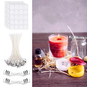 DIY candle making kit with wick stickers, cotton wicks, and holders for handmade crafts.