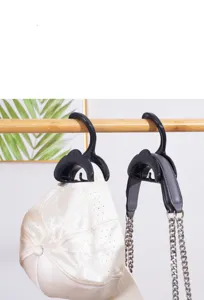 Multi-functional arch hanging hook for bags, hats, belts, and scarves in wardrobe storage.
