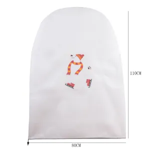 Winter plant frost cover detail showing white nonwoven fabric and cute polar bear print 80x110cm