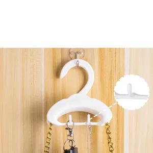 White plastic arch storage hook detail view for wardrobe bags, belts, and scarves organization.