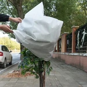 Outdoor plant freeze protection cover winter frost proof shrub protector bag white fabric