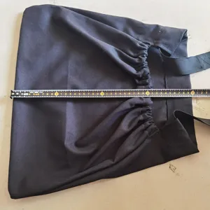 Black canvas foraging bag detail view, measured size showcase, harvesting tool accessory.