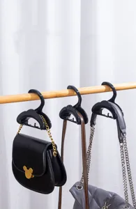 Wardrobe arch bag hanger hook for handbags, purses, belts, and scarves storage display detail view.