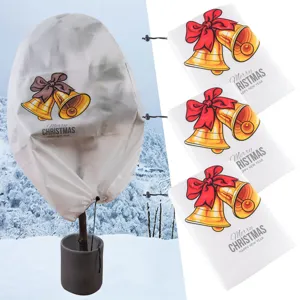 Winter frost protection plant cover detail scene showing Christmas bell pattern and drawstring.