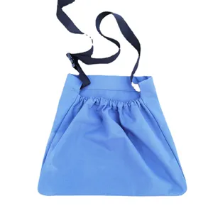 Blue canvas foraging harvest bag with adjustable black strap and buckle for outdoor fruit picking.