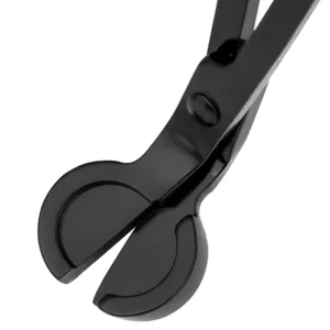 Tagliare lo stoppino della candela in acciaio inossidabile nero per candele profumate.