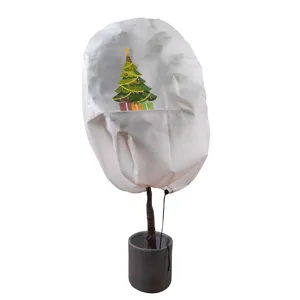Cubierta de protección de invierno para plantas de tela no tejida con estampado navideño.