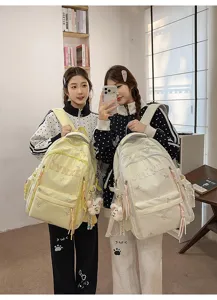 Korean style large capacity casual canvas school backpack for women and students travel daily.