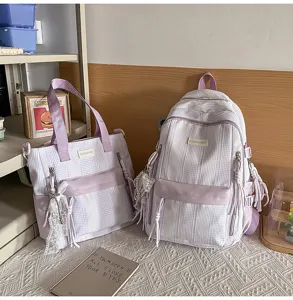 Korean style striped student backpack and tote bag set, large capacity, soft fabric.
