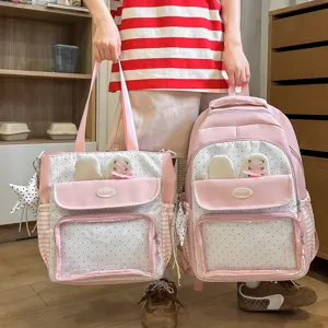 Cute pink polka dot canvas backpack and tote bag set for women, high capacity school bag.
