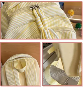Yellow white gingham student backpack detail view, stylish canvas school book bag with sturdy straps.