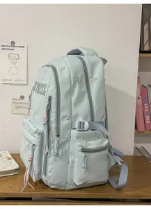 Sea salt style light blue casual backpack with cute bow embroidery and multiple functional pockets.