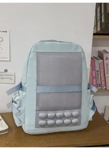 Backpack back detail showing breathable grey mesh padding, spine protection and comfort straps.