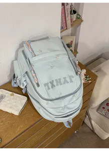 Sea salt casual canvas backpack for women, large capacity travel school bag with cute bow embroidery.