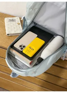 Casual large capacity light blue backpack, multi-compartment school book bag for daily travel.