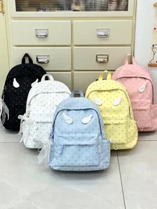 Cute heart print school backpack with angel wings, casual travel daypack for students.