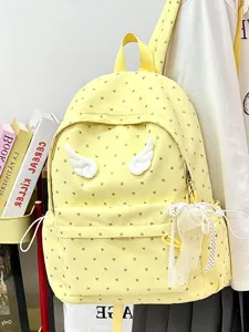 Cute yellow canvas backpack with heart print and angel wings for school girls teens.