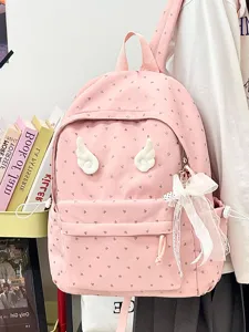 Pink cute heart print school backpack with angel wings and lace bow for teen girls daily use.