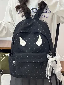 Cute black backpack with heart print, angel wings and lace bow detail for daily travel use.