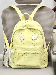 Cute yellow canvas backpack with angelic wings and heart prints for school travel and daily wear.