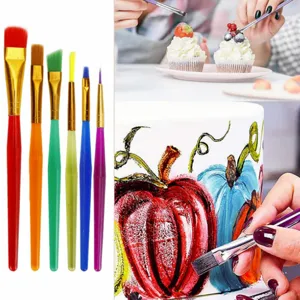 Detailed view of colorful cake painting brushes set for baking and cookie decorating.